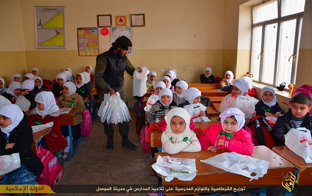 5_ISIS gives out school supplies.jpg