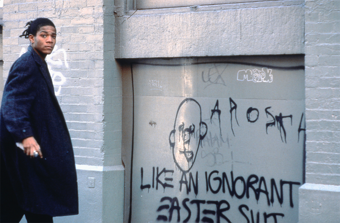 9. LIKE AN IGNORANT EASTER SUIT, Jean-Michel Basquiat on the set of Downtown 81, Edo Bertoglio ©New York Beat Film LLC.png